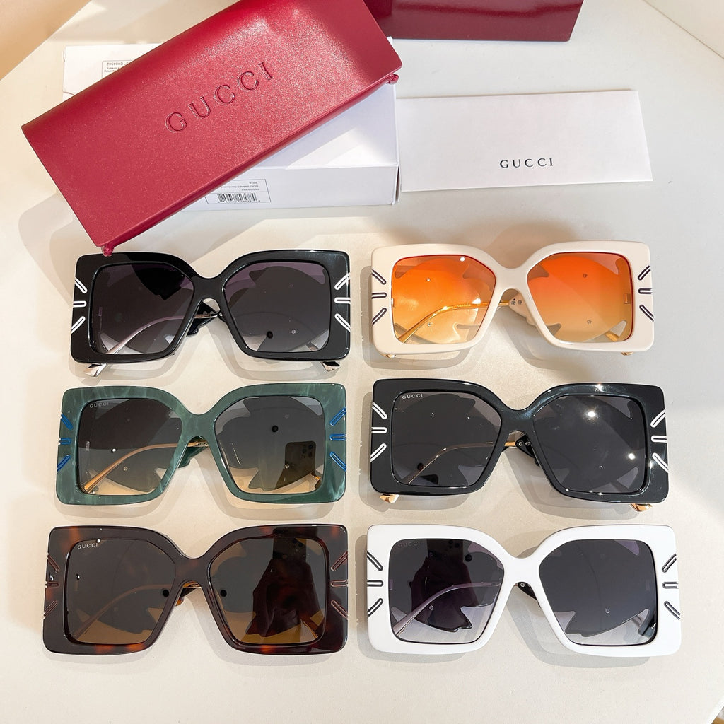 Assorted square sunglasses set with orange, blue-green, brown, and white frames and logo