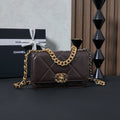 Chanel quilted shoulder bag with gold chain strap and CC turn-lock clasp