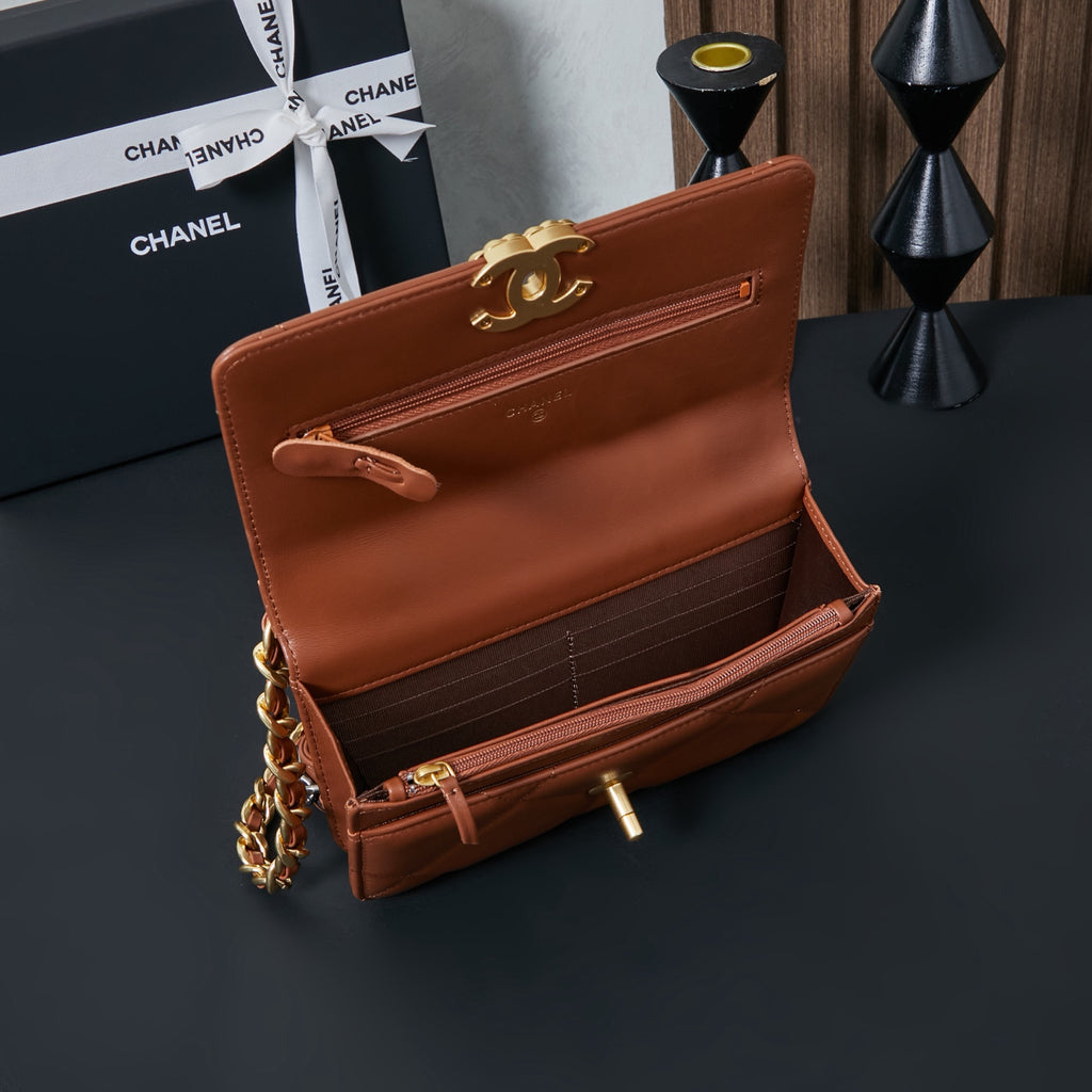 Chanel bag in tan-brown with open flap, quilted interior, and gold clasp