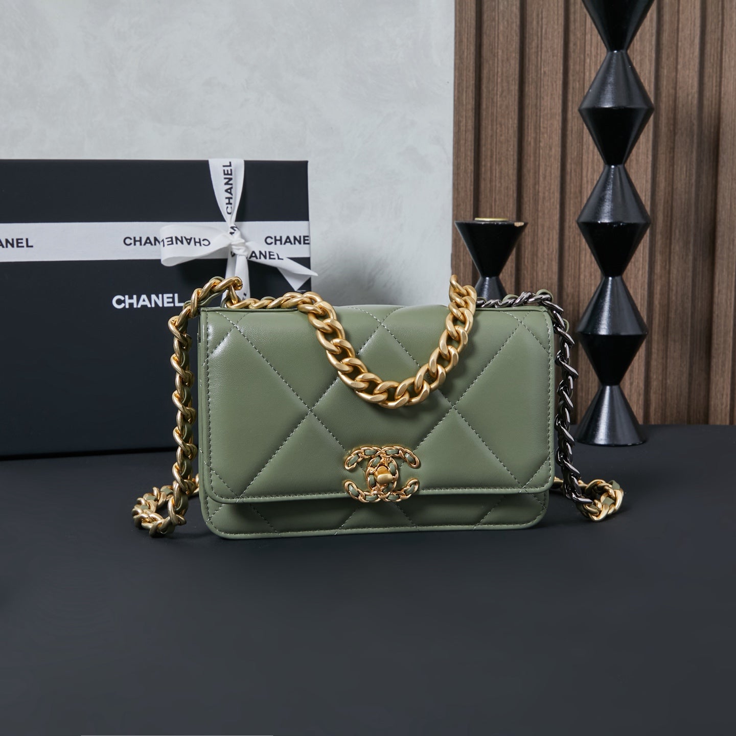 Olive green Chanel quilted flap bag with gold-tone chain strap