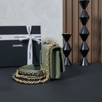 Olive green Chanel mini flap bag with long chain strap and top flap hardware