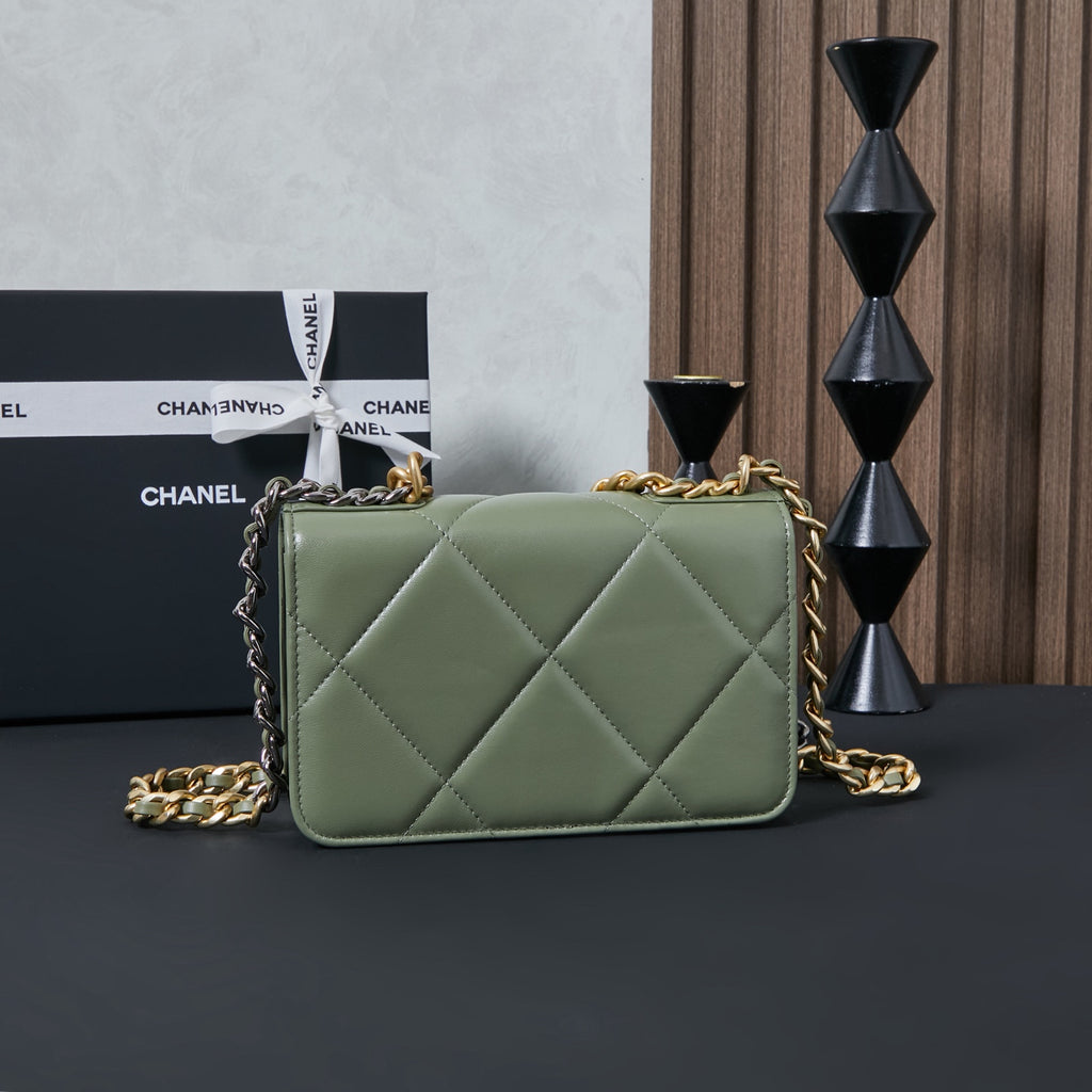 Olive green Chanel quilted flap bag front view with gold-tone chain strap
