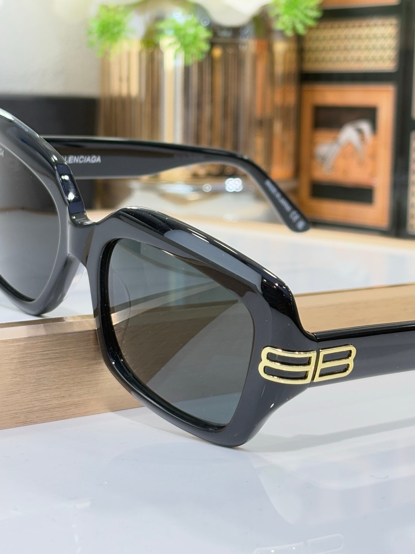 Balenciaga glasses, black frame with large square lenses and gold double-B temple logo