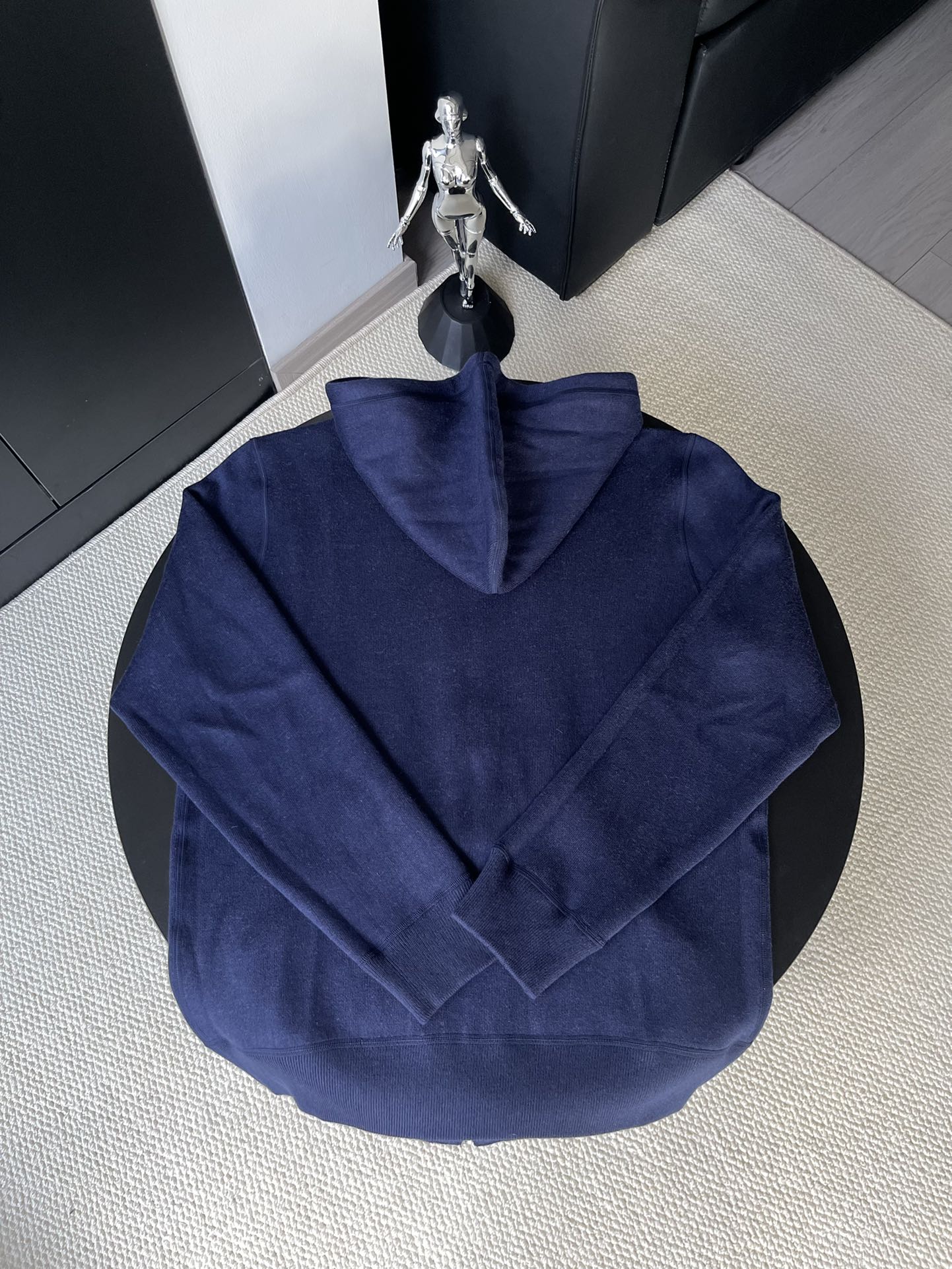 Navy long-sleeve zip hoodie with pointed hood and full-zip front