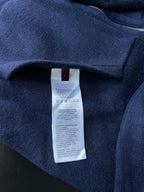 Navy zip hoodie with interior size tag on neckline seam