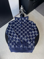 Navy long-sleeve zip hoodie with allover GG pattern, front view