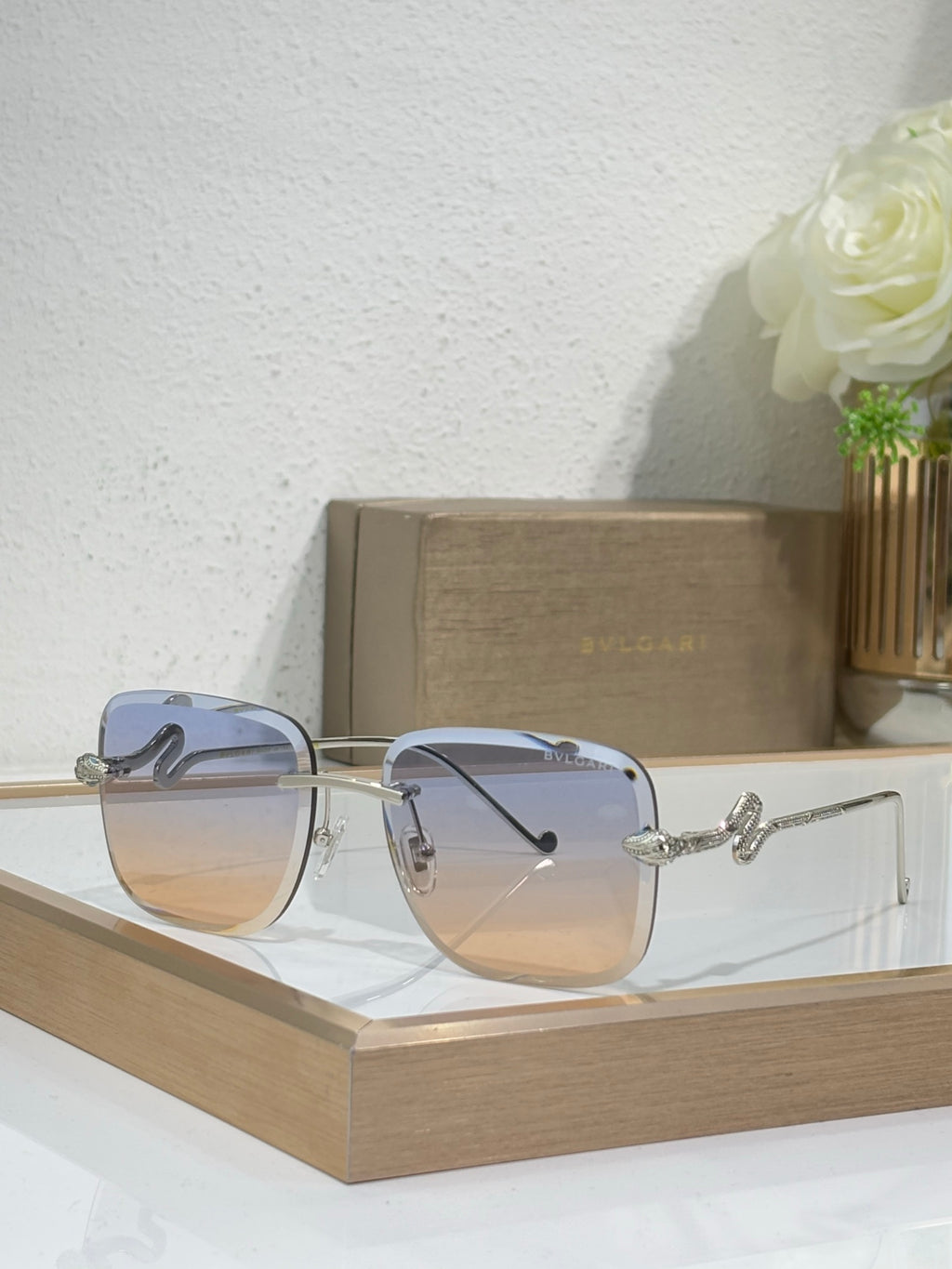 Bvlgari round sunglasses with silvertone frame and smoky gradient lenses