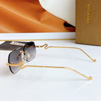 Bvlgari sunglasses with gold frame and dark mirrored round lenses