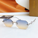 Bvlgari sunglasses with silver frame and light blue mirrored lenses