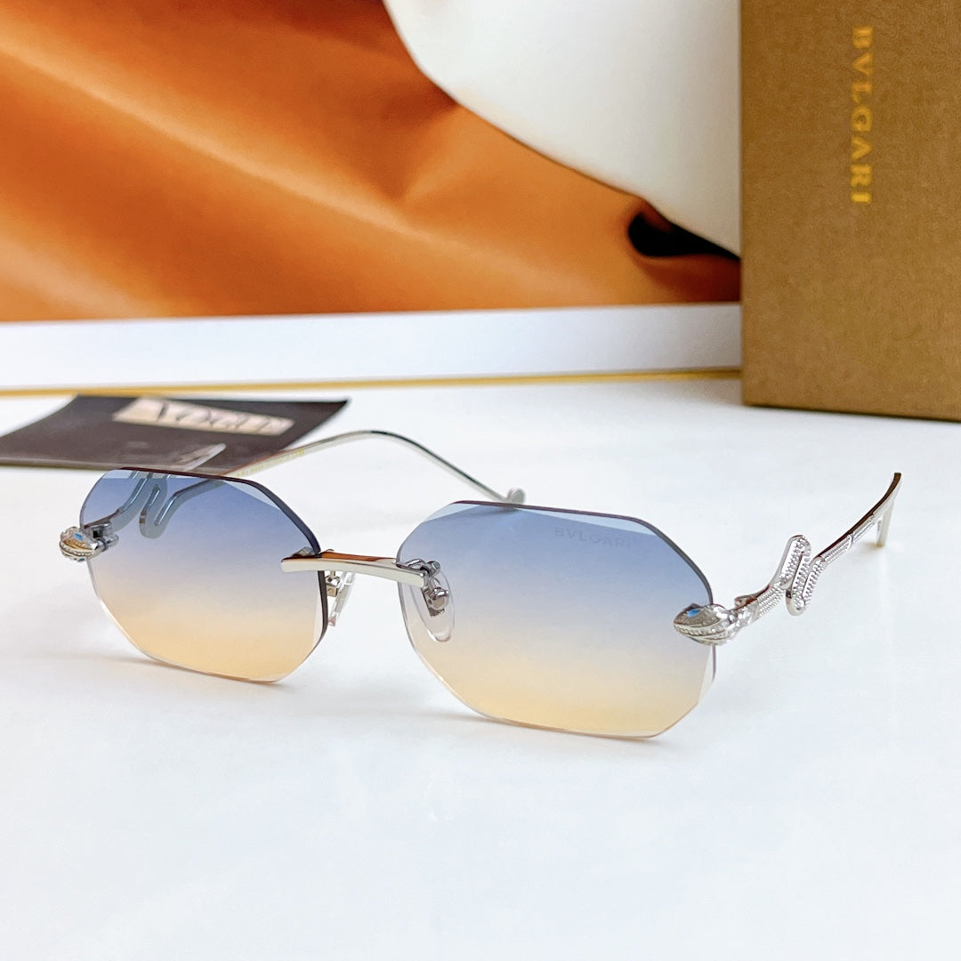 Bvlgari sunglasses with silver frame and light blue mirrored lenses