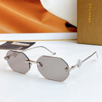 Bvlgari sunglasses with silver frame and gray mirrored lenses