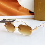 Bvlgari sunglasses with gold frame and amber mirrored lenses