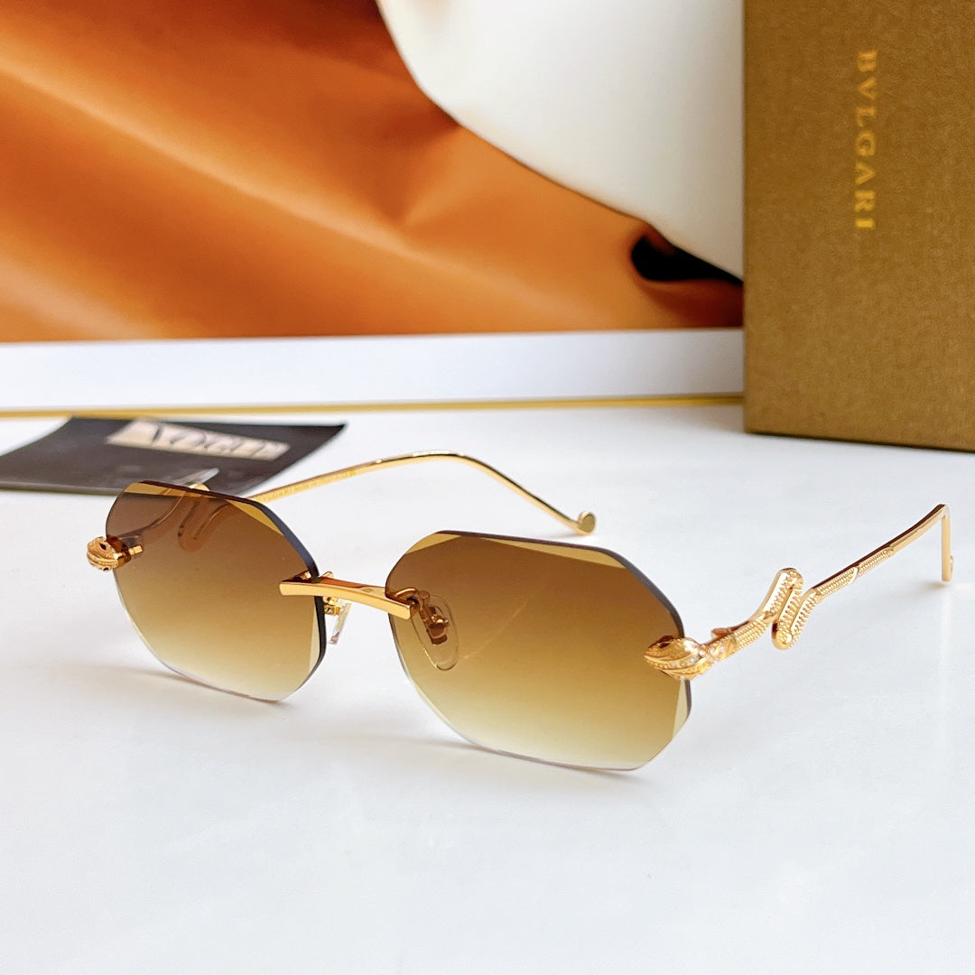 Bvlgari sunglasses with gold frame and amber mirrored lenses