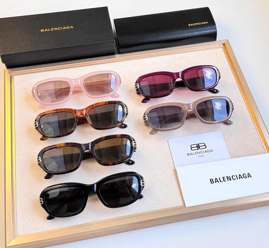 Balenciaga sunglasses assortment with four pairs in mixed colors and matching cases