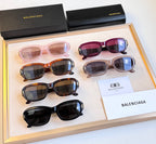 Balenciaga sunglasses assortment with four pairs in mixed colors and matching cases