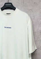 White short-sleeve T-shirt with crew neckline and small black Balenciaga logo