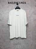 White short-sleeve T-shirt with small black Balenciaga logo on the chest