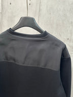 Black sweatshirt with contrasting upper panel and crew neckline
