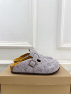 Monogram slide sandals, light gray suede-style with strap and square metal buckle