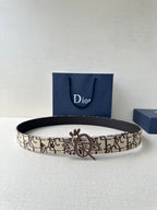 Dior belt with beige logo canvas strap, black inner edge, gold-toned clasp