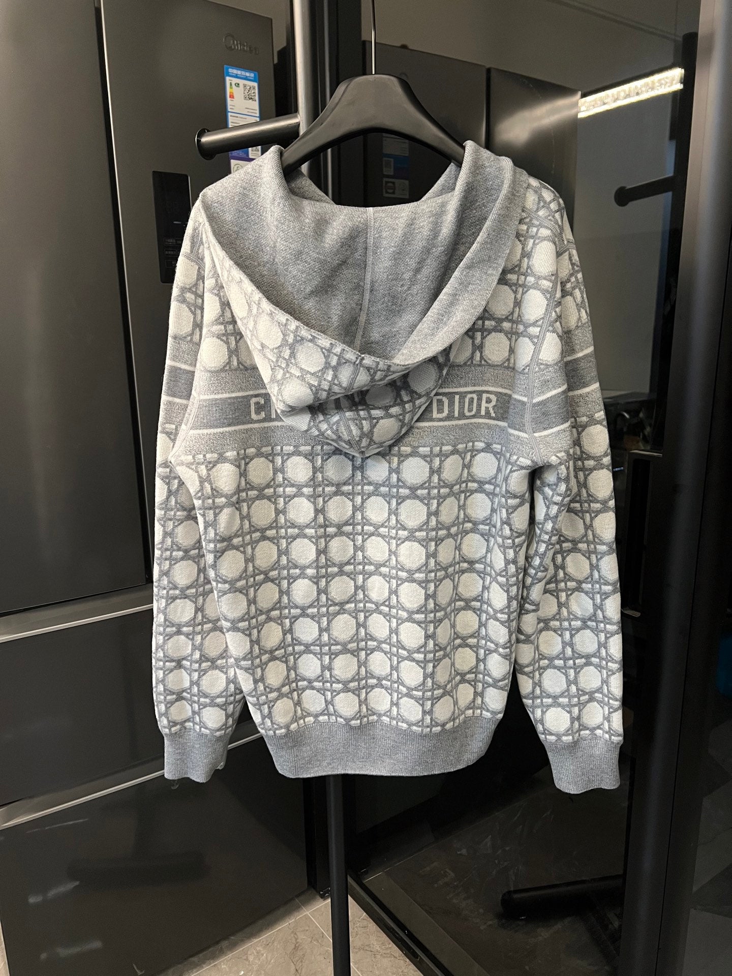 Grey zip-up hoodie with allover Dior monogram print and hood, front view