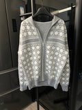 Grey zip-up hoodie with white Dior-style monogram pattern panels and hood