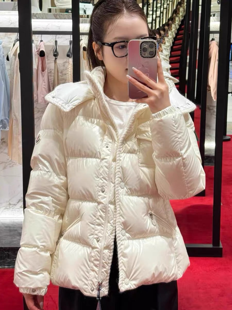 Off-white long puffer jacket with hood and quilted baffles worn by model