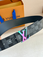 Gray checkered belt close-up with multicolor LV buckle and belt holes