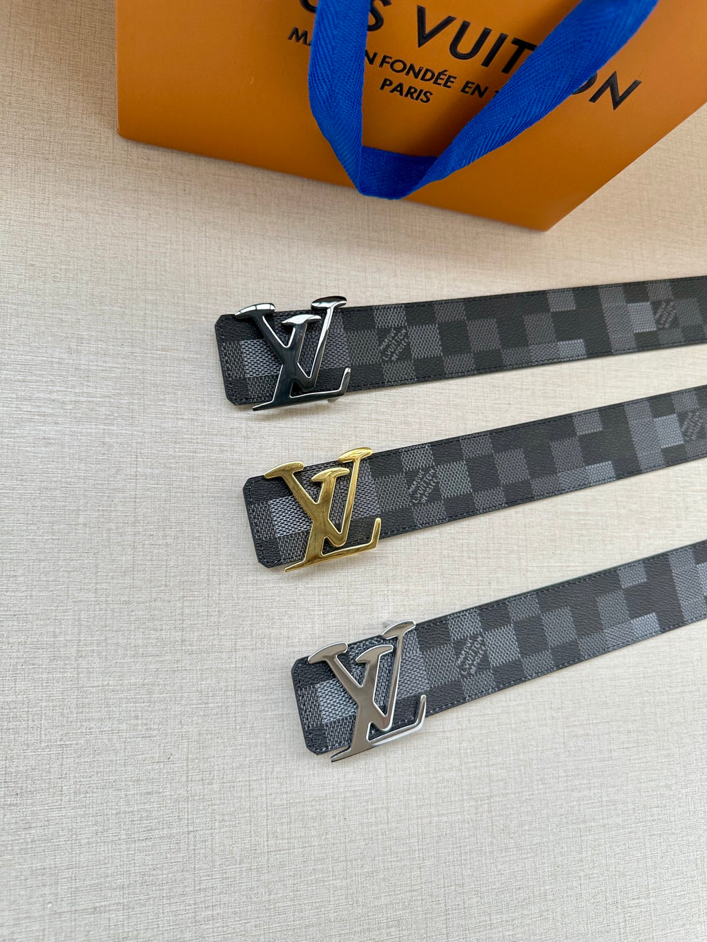 Louis Vuitton Damier check belt with silver and gold LV buckles