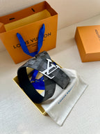 Louis Vuitton Damier check belt laid flat with silver-toned LV buckle