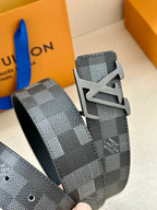 Louis Vuitton Damier check belt strap with silver-toned LV buckle detail