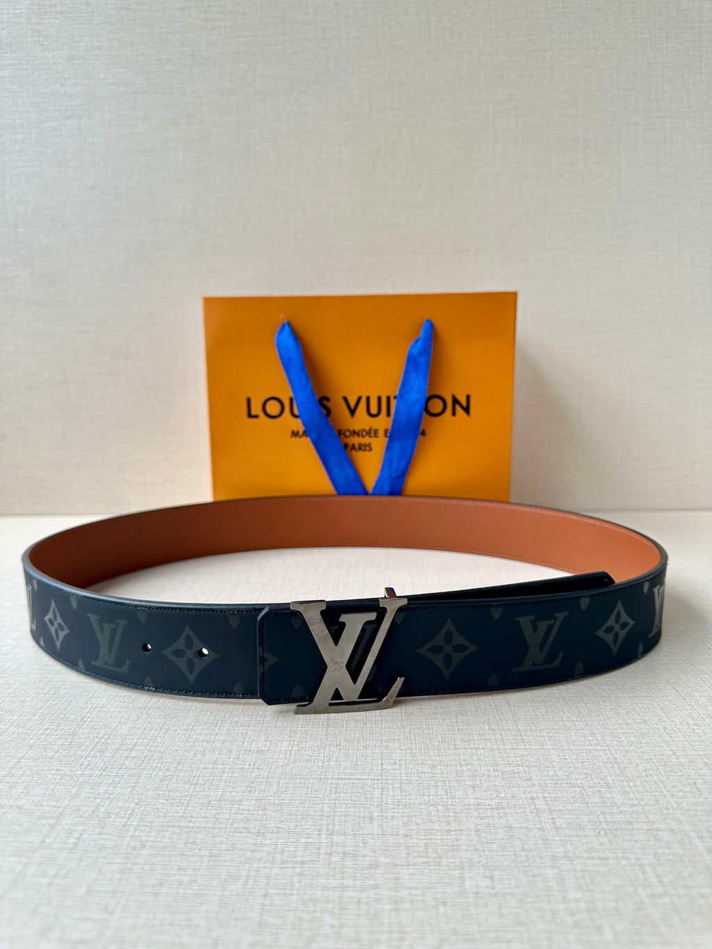 Louis Vuitton belt in dark navy monogram canvas with large silver buckle