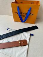 Louis Vuitton belt with tan leather strap and small square gold buckle, single keeper
