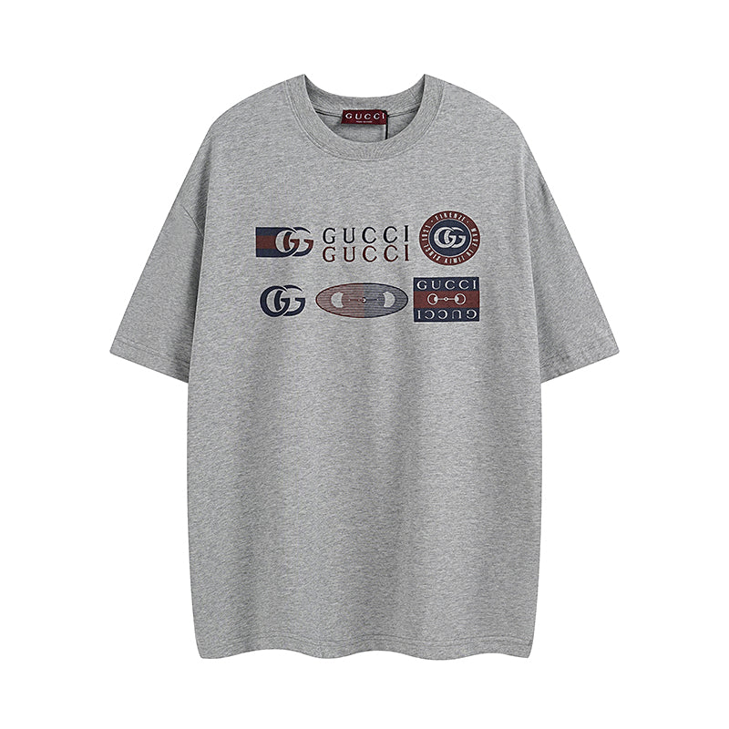 Grey short-sleeve T-shirt with Gucci logo graphics across the chest