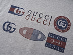 Grey T-shirt with multicolor Gucci logo print and crest emblem
