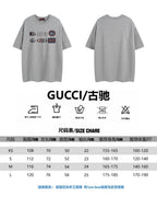 Grey Gucci T-shirt shown with size chart