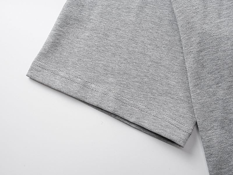 Grey short-sleeve T-shirt with stitched curved hem