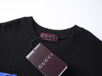 Black crew-neck T-shirt with inner neck tag and collar seam