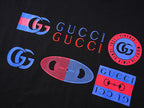 Black short-sleeve T-shirt featuring large multicolor graphic print