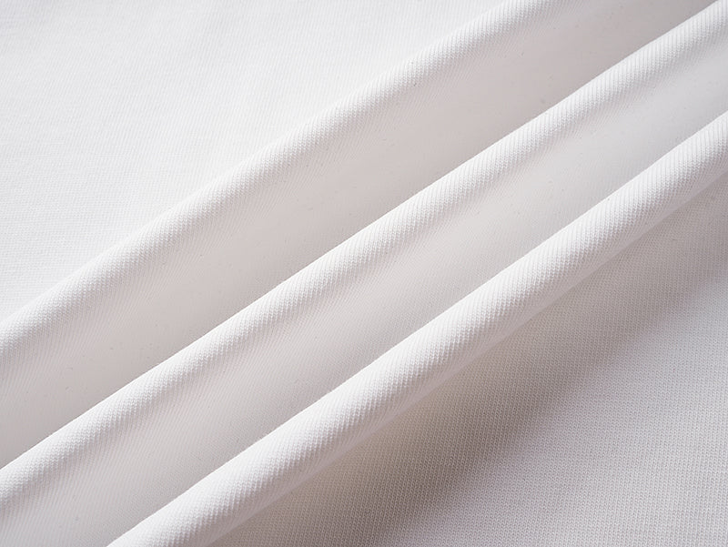 White Gucci T-shirt fabric close-up with smooth knit texture