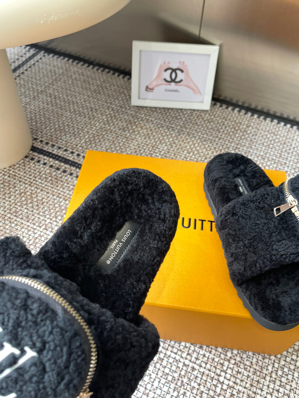 Louis Vuitton unisex black fuzzy slides with zipper strap and logo patch