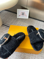 Louis Vuitton unisex black fuzzy slides with zipper strap and logo medallion