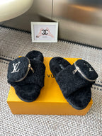 Louis Vuitton unisex black fuzzy slides, pair with side zippers and logo details