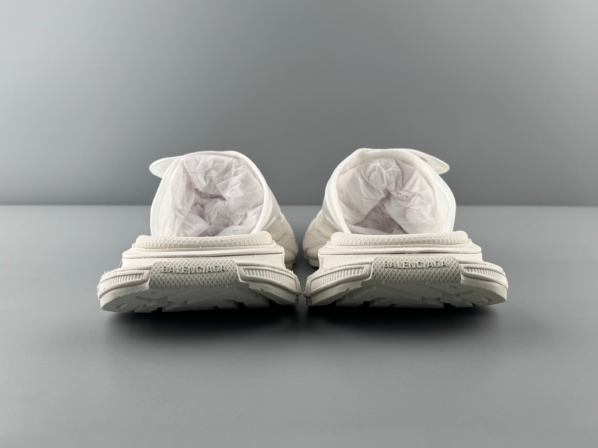 Balenciaga slide sandals, white, rear view with padded straps and textured footbed