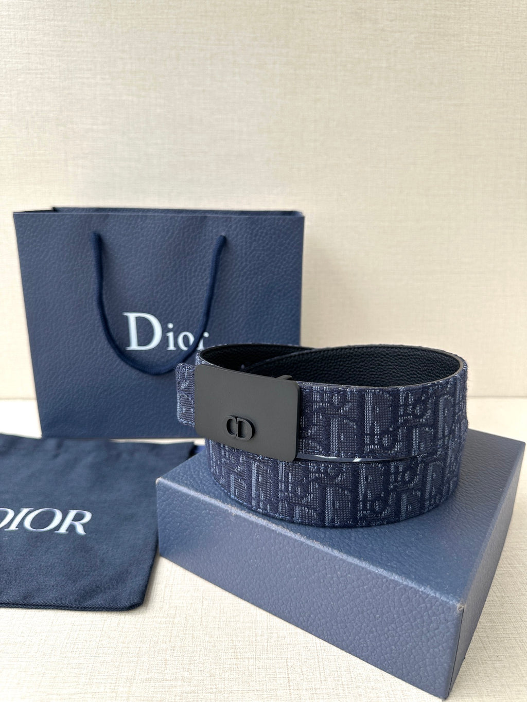 Dior belt in navy logo jacquard with black buckle and stitched strap edge