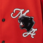 Red varsity jacket embroidered black panther-style graphic with cursive detail