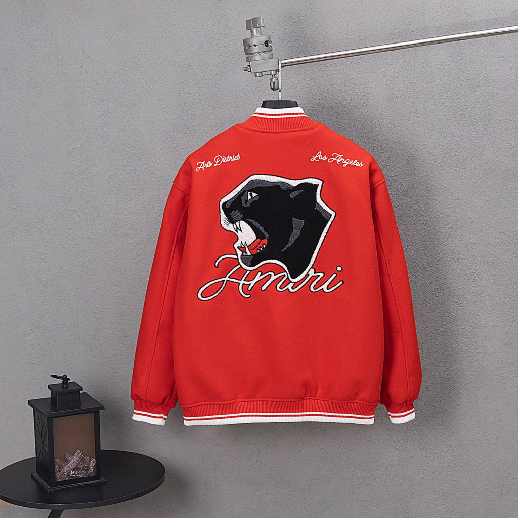 Red varsity jacket back with large black panther-style graphic and Amiri script