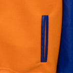 Orange varsity jacket sleeve stripe panel with blue trim and curved edge detail