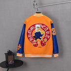 Orange and blue varsity jacket with large back emblem and striped ribbed hem