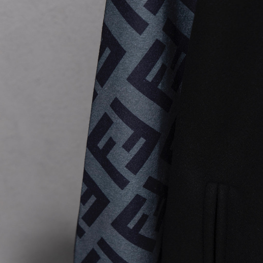 Black jacket sleeve detail with large FF logo pattern panel